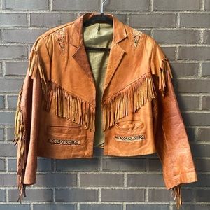 vintage handmade leather fringe jacket with tribal details